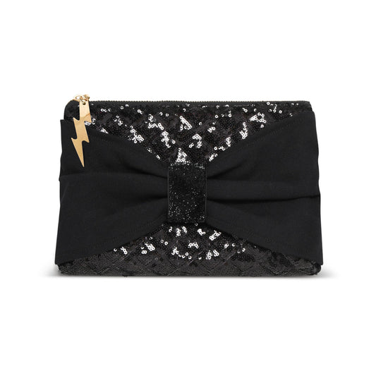 A black clutch bag featuring a large bow at the center, a black sequined flap, and a gold-tone lightning bolt zipper pull on a plain white background.