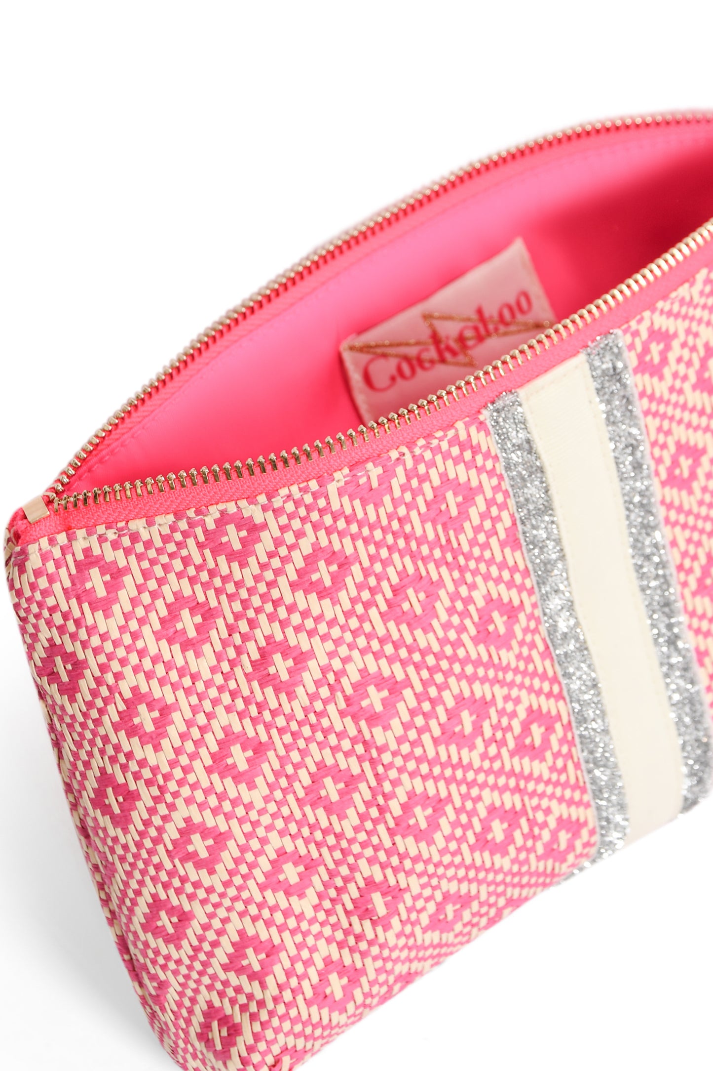 Pink patterned cockatoo pouch clutch bag with a visible brand label on a white background