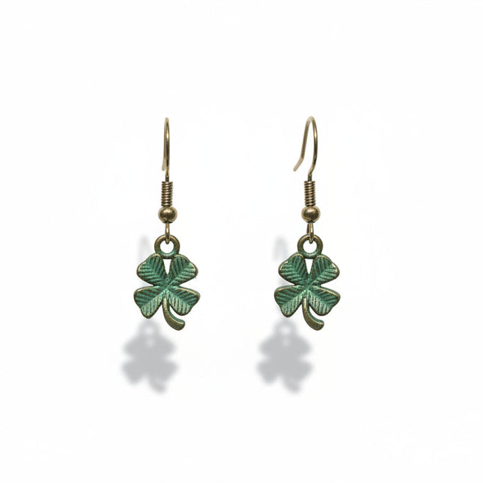 Pair of lucky 4 leaf clover earrings with green leaves on a white background