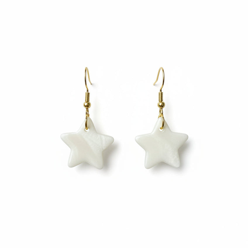 Star-shaped earrings on a white background