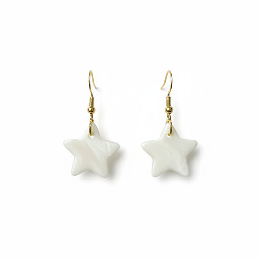 Star-shaped earrings on a white background